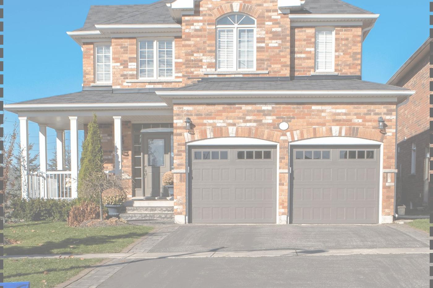 Brick house with double garage doors